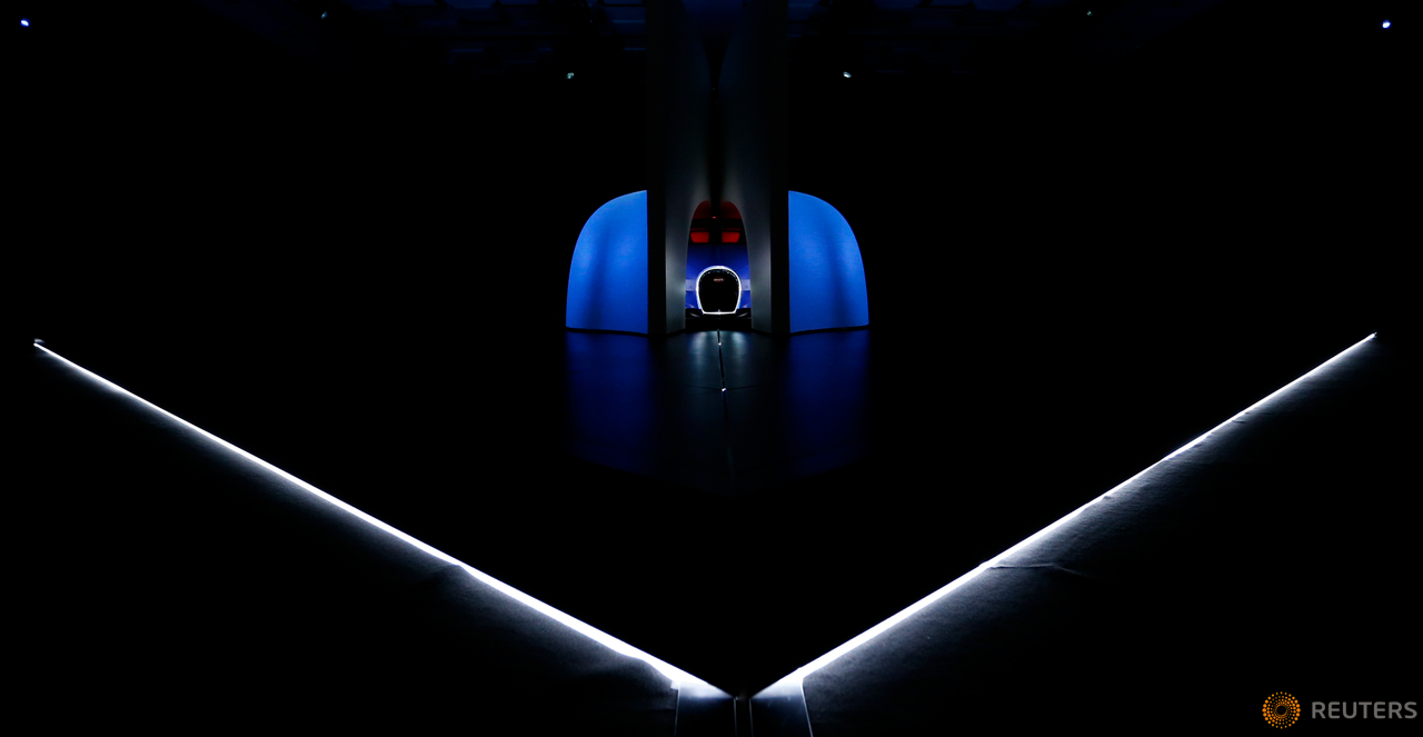 The new Bugatti Chiron car is unveiled during presentation ahead of the 86th International Motor Show in Geneva, Switzerland, February 29, 2016.   