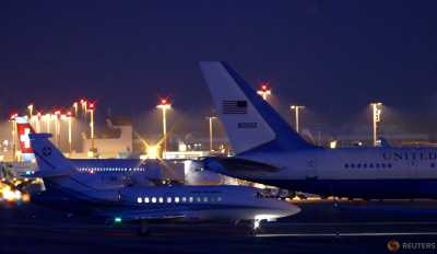 A plane (L) carrying three Iranian-Americans, who left Tehran under a prisoner swap, lands at Cointrin airport in Geneva, Switzerland January 17, 2016. A plane (L) carrying three Iranian-Americans, who left Tehran under a prisoner swap, lands at Cointrin airport in Geneva, Switzerland January 17, 2016.