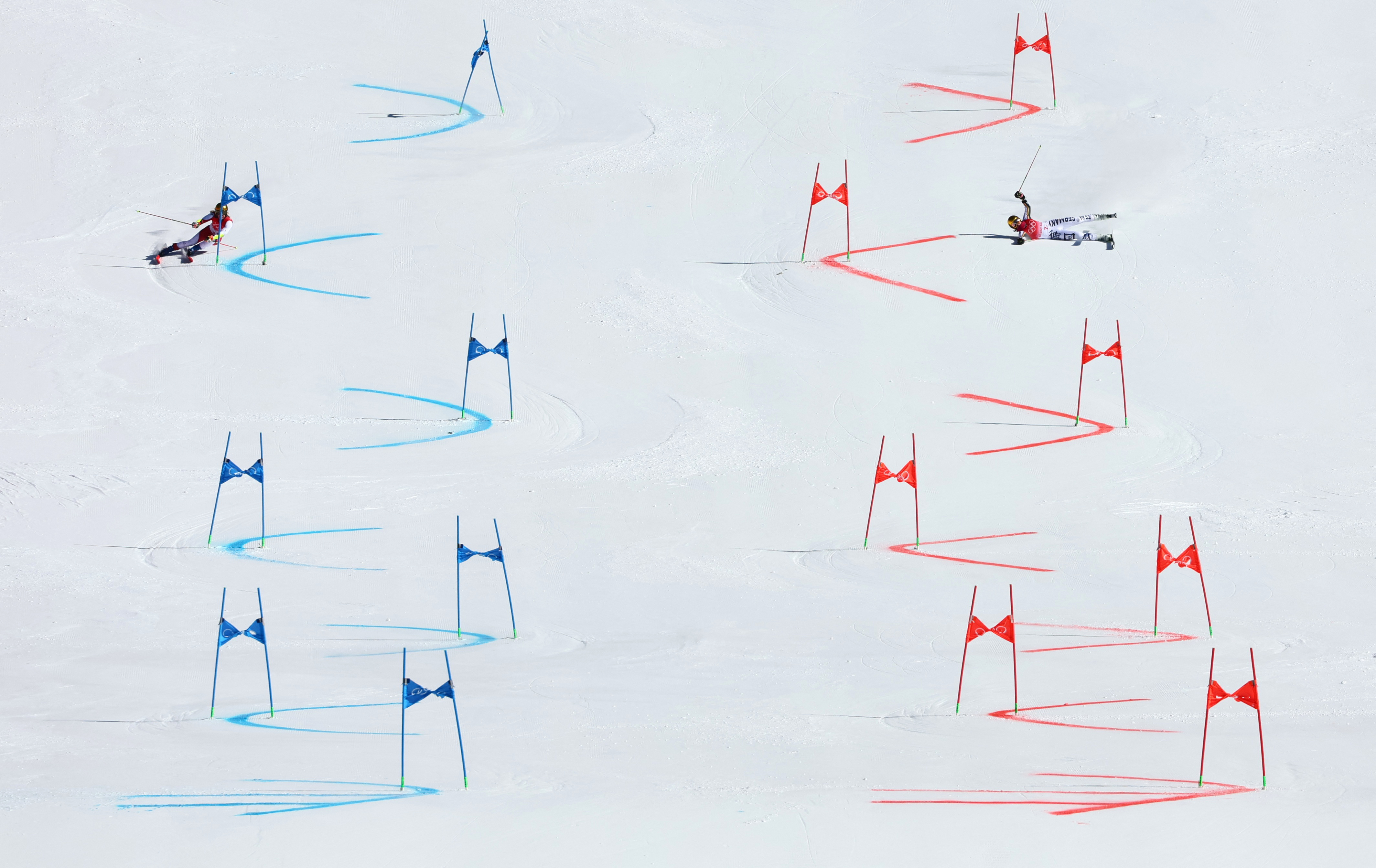 2022 Beijing Olympics - Alpine Skiing - Mixed Team Parallel Big Final - National Alpine Skiing Centre, Yanqing district, Beijing, China- February 20, 2022. Katharina Liensberger of Austria and Emma Aicher of Germany in action. REUTERS/Denis Balibouse
