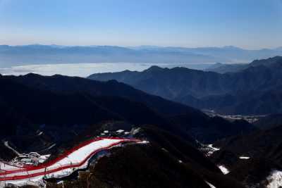 2022 Beijing Olympics - Alpine Skiing - Men's Super-G - National Alpine Skiing Centre, Yanqing district, Beijing, China - February 8, 2022. A general view of the landscape as James Crawford of Canada in action on the course. REUTERS/Denis Balibouse