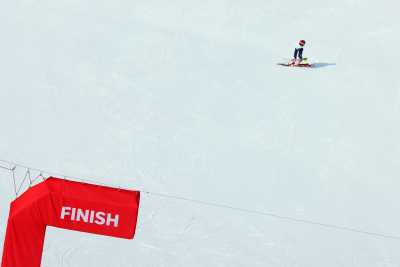 2022 Beijing Olympics - Alpine Skiing - Women's Slalom Run 1 - National Alpine Skiing Centre, Yanqing district, Beijing, China - February 9, 2022. Mikaela Shiffrin of the United States skis away after not finishing her run. REUTERS/Denis Balibouse