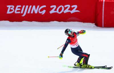 2022 Beijing Olympics - Alpine Skiing - Women's Slalom Run 2 - National Alpine Skiing Centre, Yanqing district, Beijing, China - February 9, 2022. Charlie Guest of Britain reacts after her run. REUTERS/Denis Balibouse