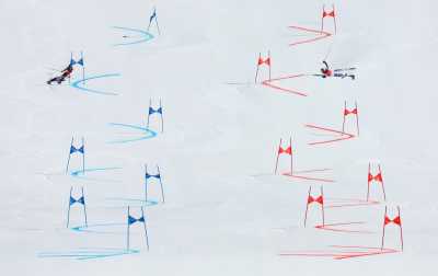 2022 Beijing Olympics - Alpine Skiing - Mixed Team Parallel Big Final - National Alpine Skiing Centre, Yanqing district, Beijing, China- February 20, 2022. Katharina Liensberger of Austria and Emma Aicher of Germany in action. REUTERS/Denis Balibouse